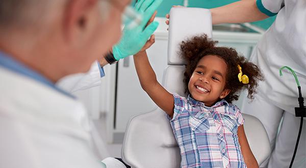 girl high five dentist girl high five dentist