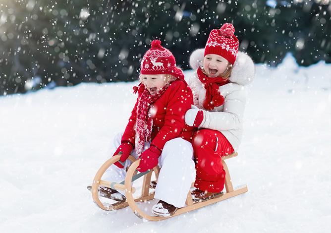 two kids having fun snow two kids having fun snow