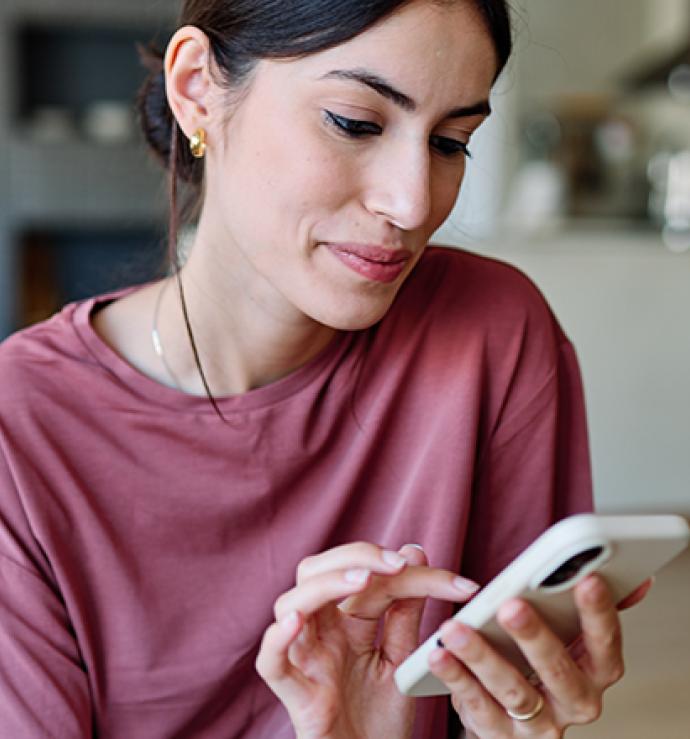 Woman interacting with smartphone