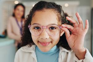 Child with new glasses
